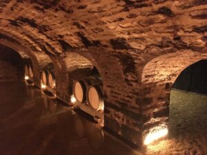 Wine cellar with barrels in Burgundy