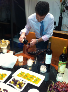 Sean Cochran pouring Bordeaux during a 2012 tasting before the family's move to Australia