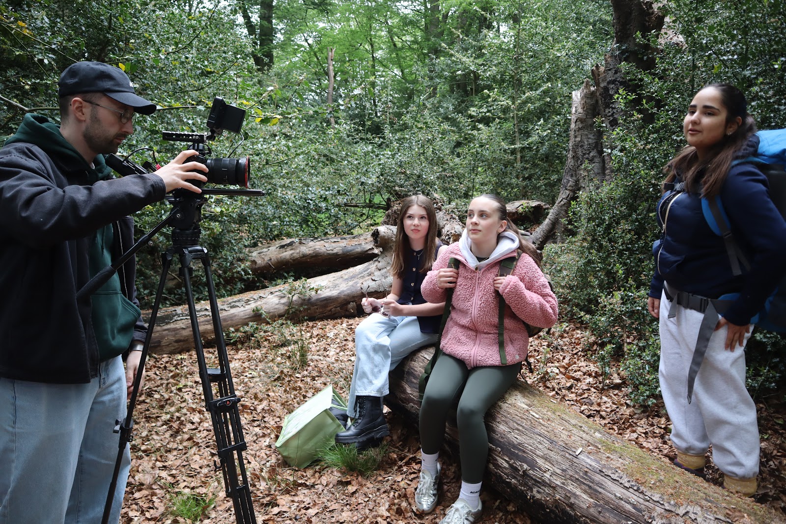 HFTD Pros filming a scene in the woods with a professional camera