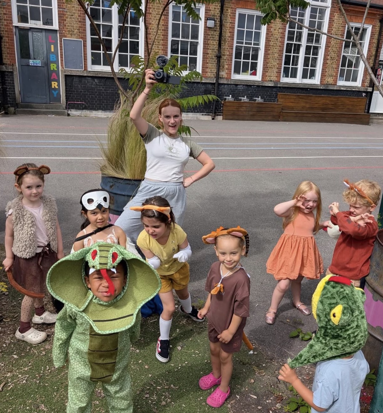 HFTD Minis in animal costumes being filmed by their teacher on costume day
