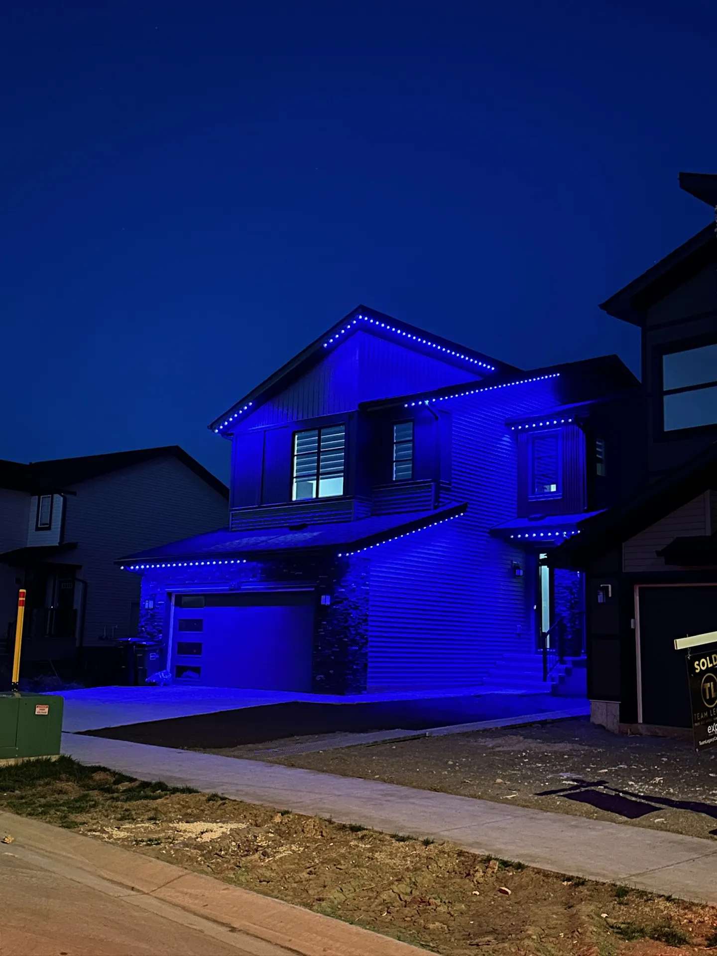 Home lit in blue permanent LED lighting