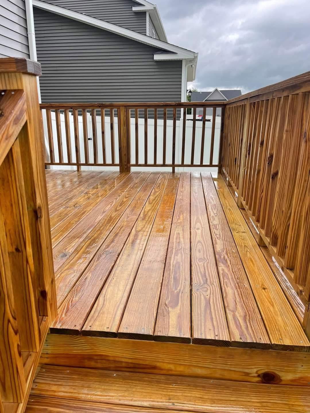 Clean, refreshed deck after restoration by Prowash Missouri.