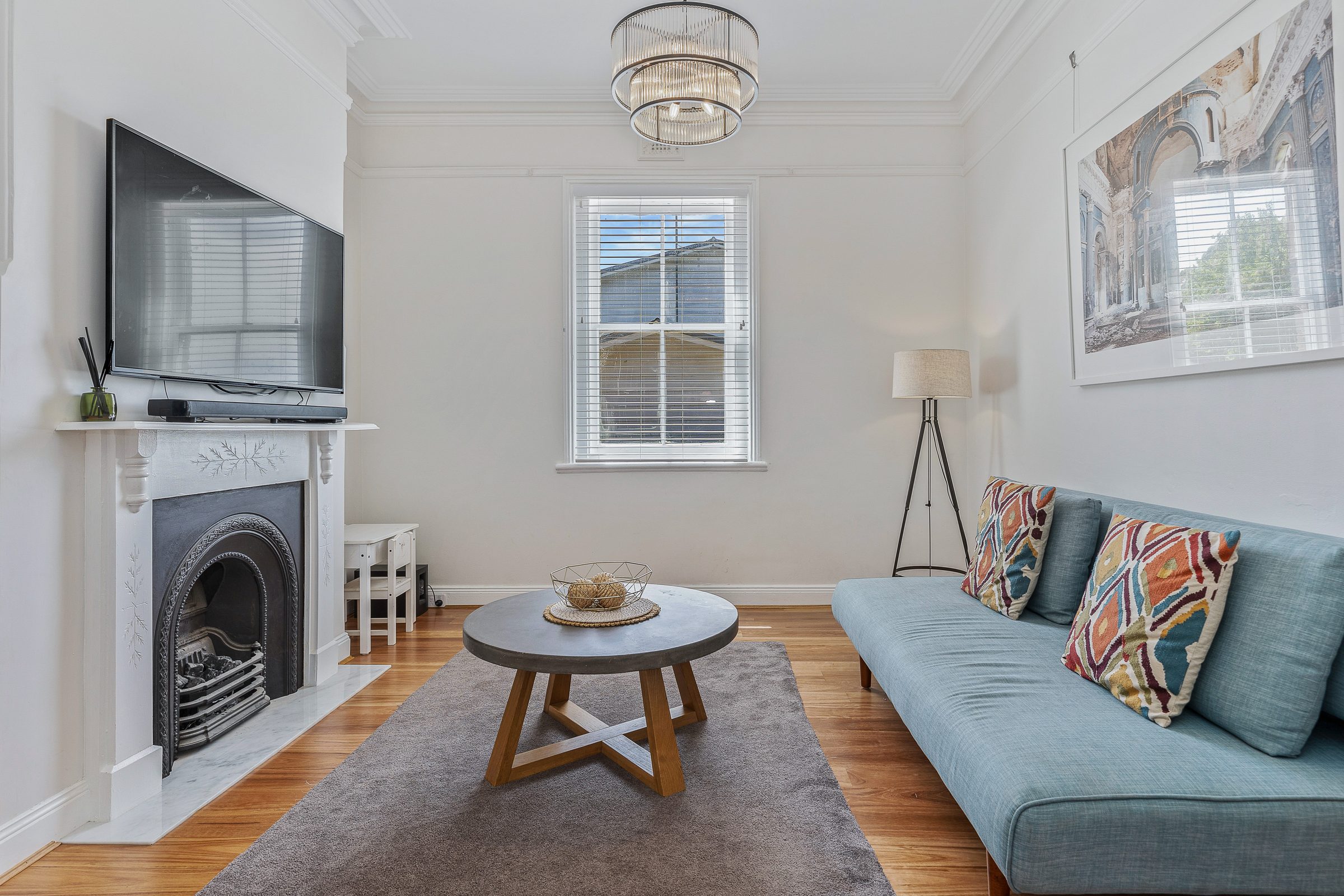 Front lounge with original ceiling and fireplace