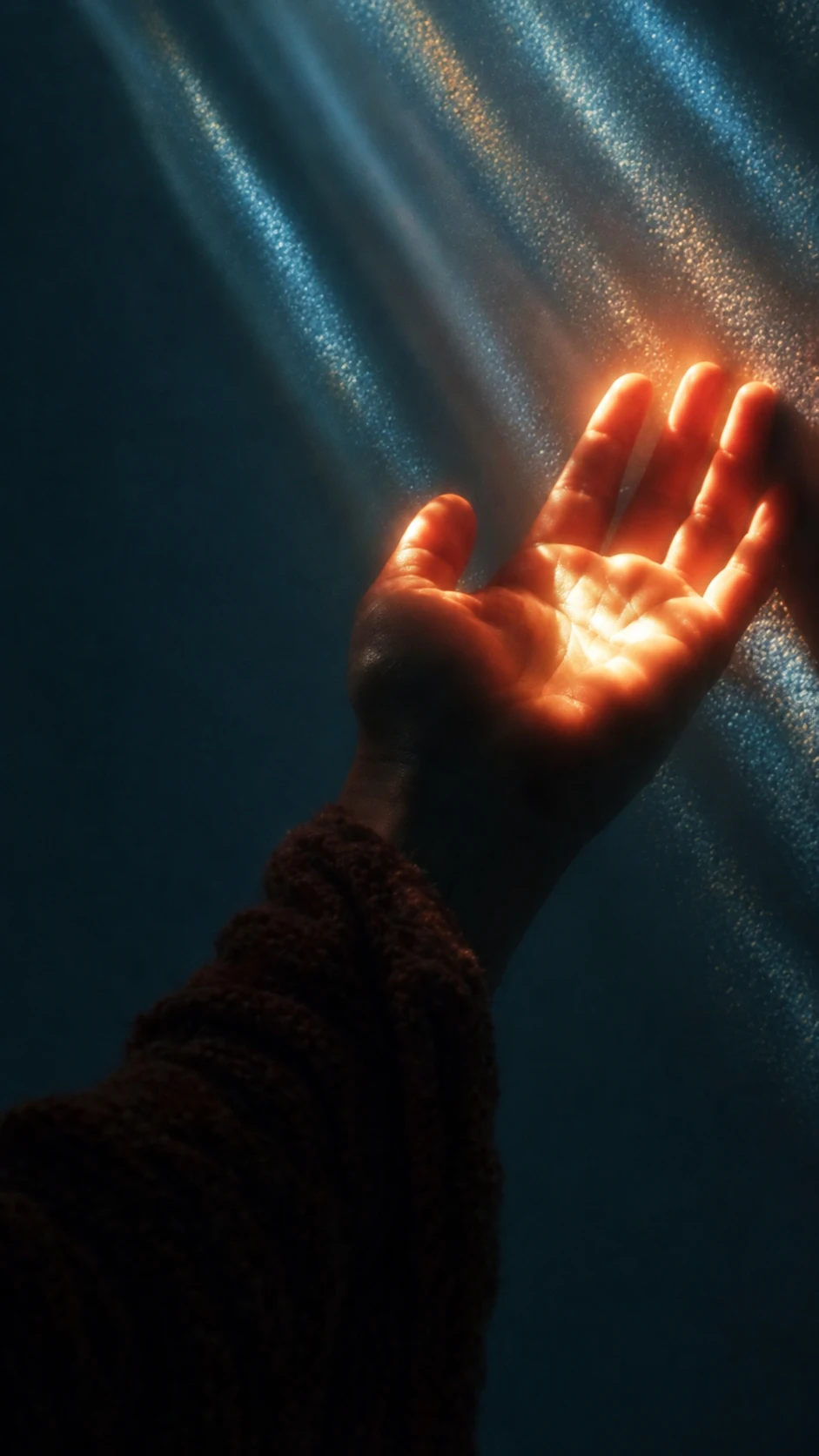 Light falling into an open hand