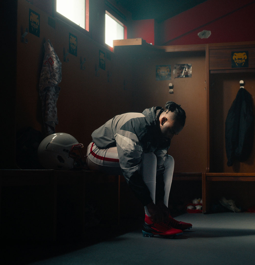 A Venum fighter crouching in a mountain meadow, from the Unstoppable Journey film
