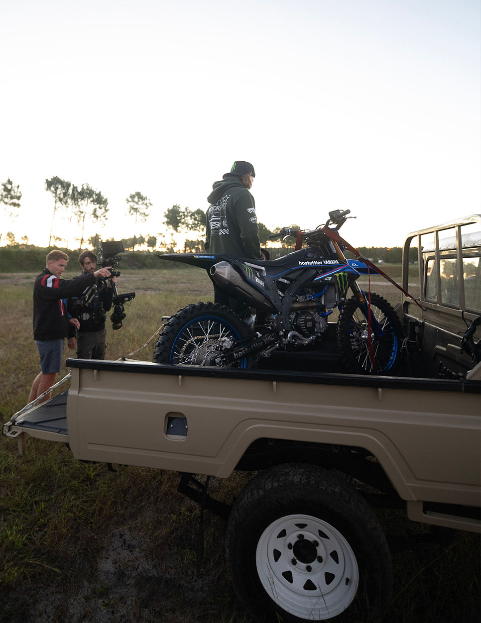 Crew loading the motocross bike at sunset, Venum Unstoppable Journey backstage