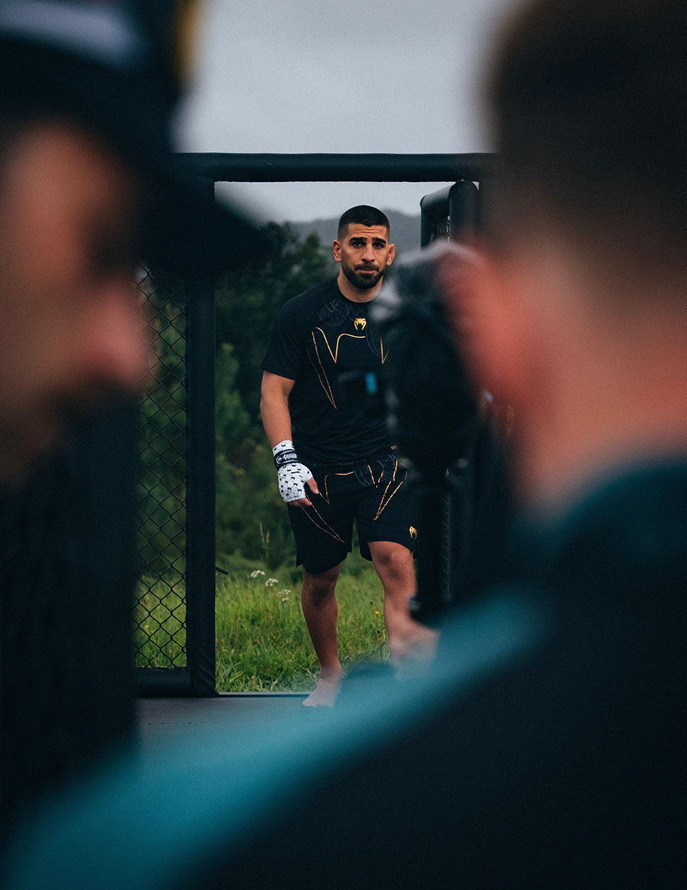 Fighter stepping out of the cage on set, Venum Unstoppable Journey