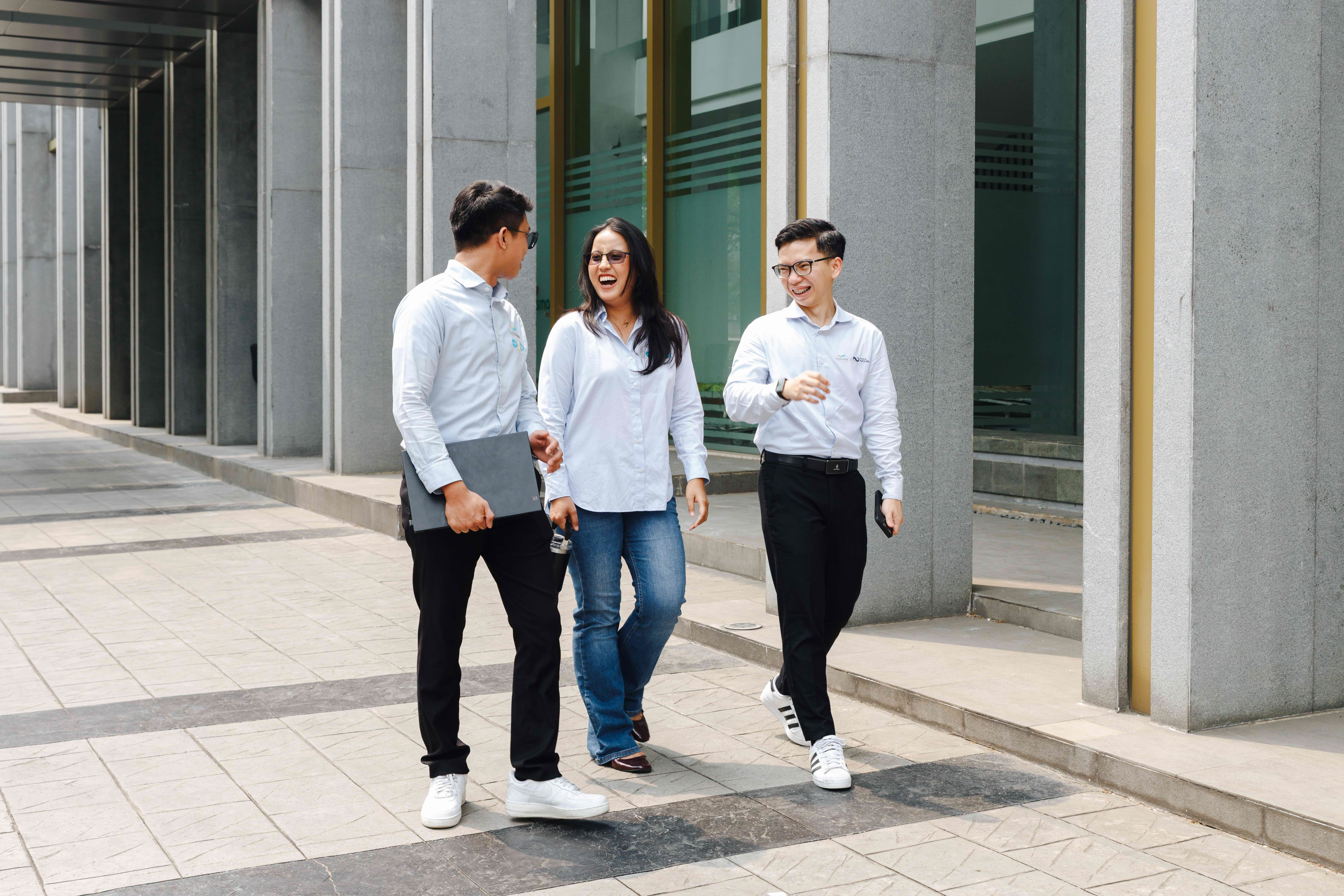Logiframe team walking together outside an office