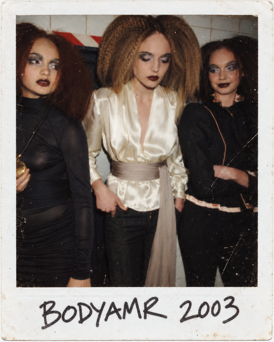 BODYAMR backstage fashion Polaroid portrait of three models