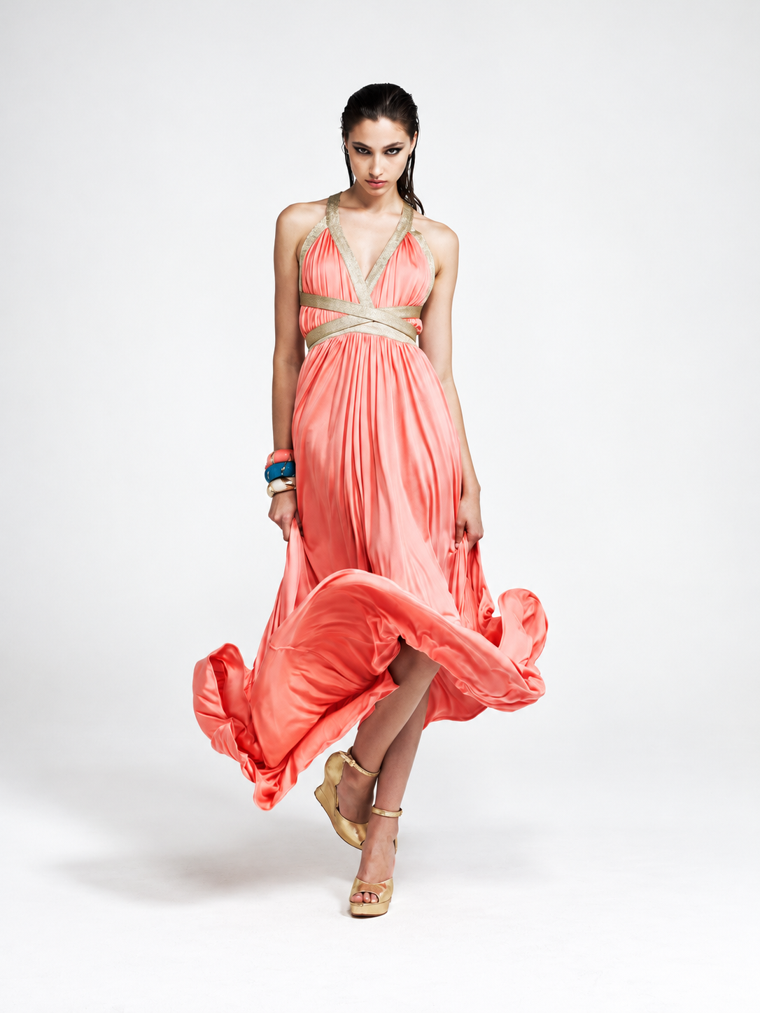 BODYAMR Collection 2011 coral halterneck dress with gold trim and flowing skirt