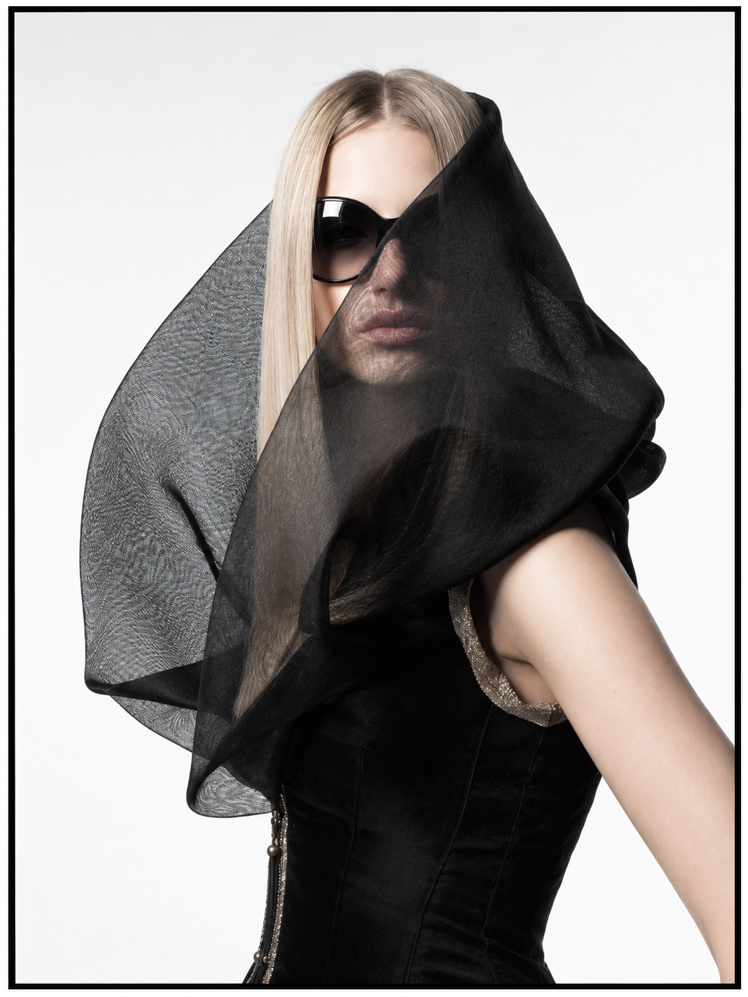 BODYAMR Collection 2003 — black sculptural sheer veil look and sunglasses by Omani designer Amr Ali