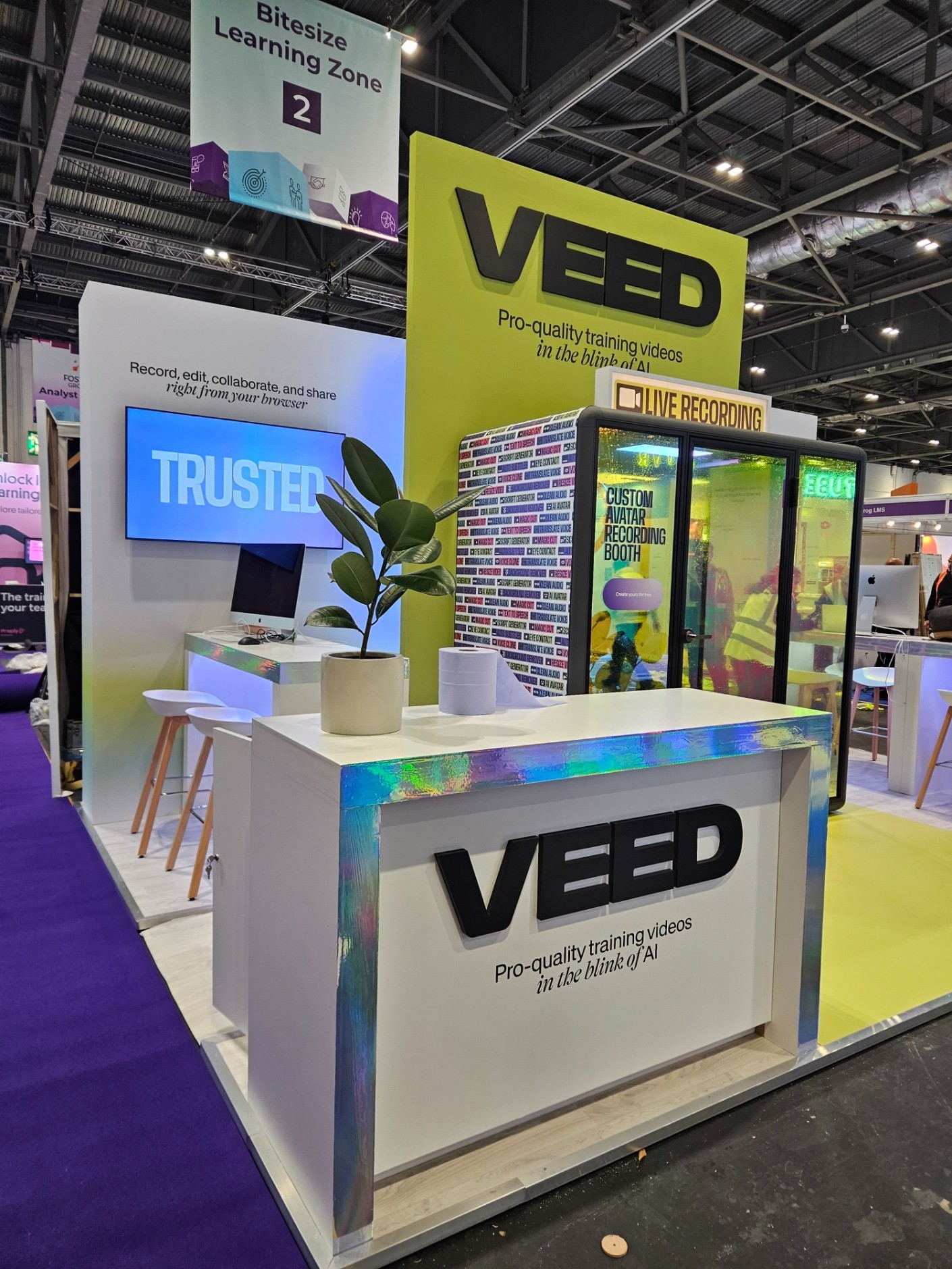 VEED reception counter and holographic trim