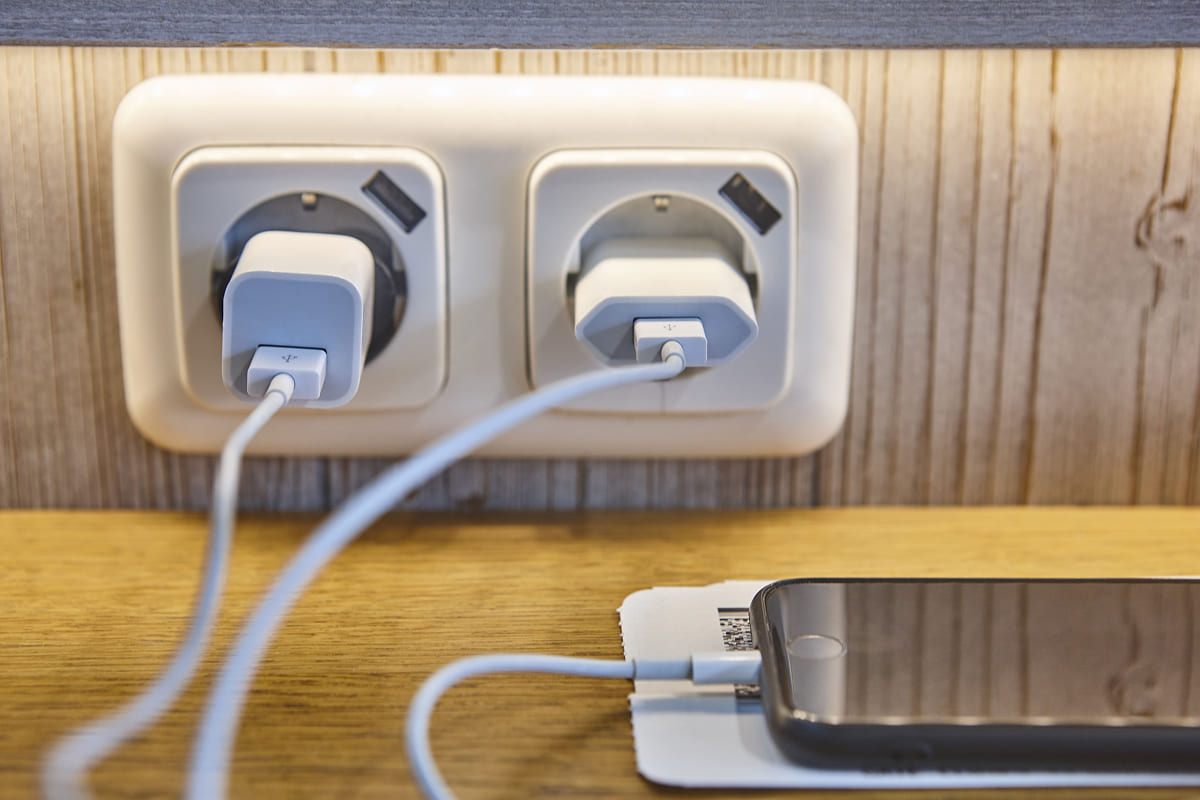 Phone plugged into a public socket