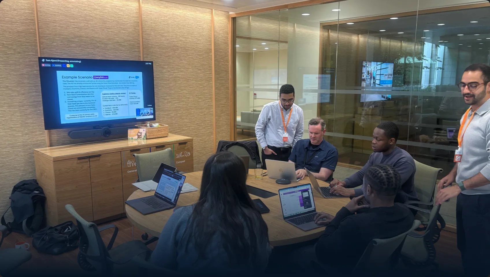 The Symbe team collaborating around a meeting table
