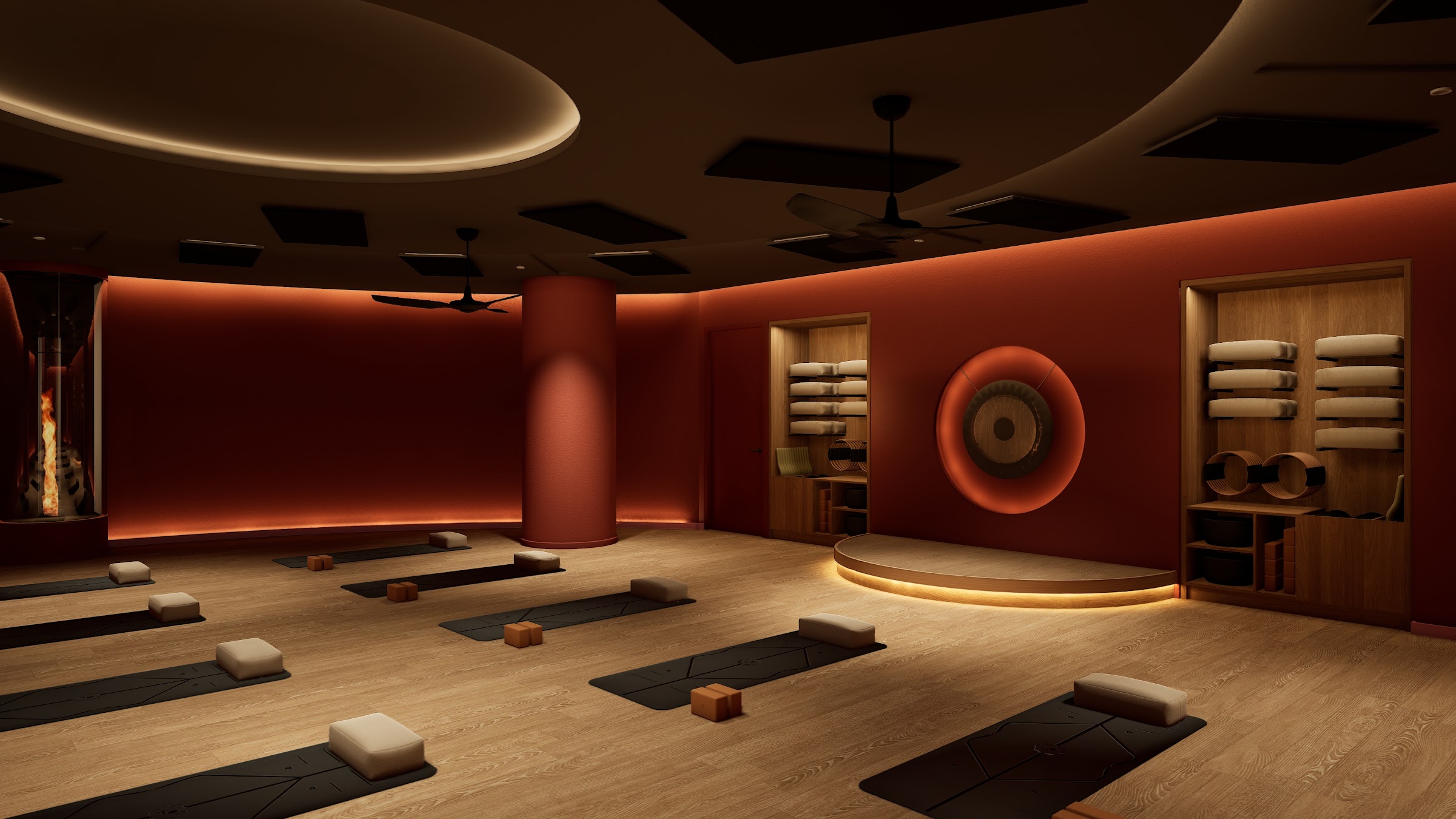 A member holding a side plank under the gong in the Glow studio