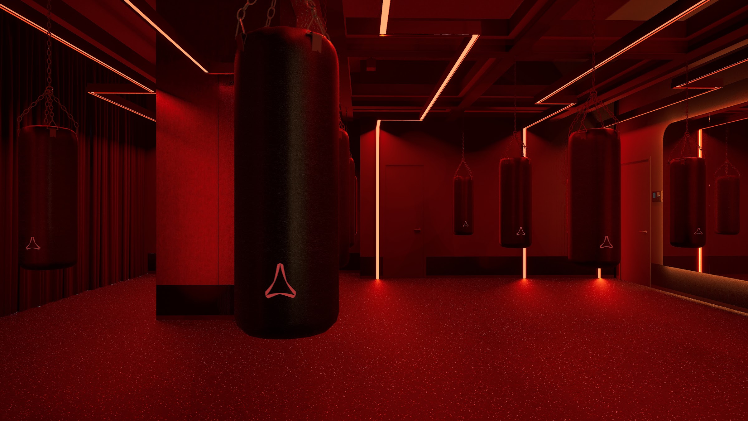 Heavy bags hanging in the Strike boxing studio