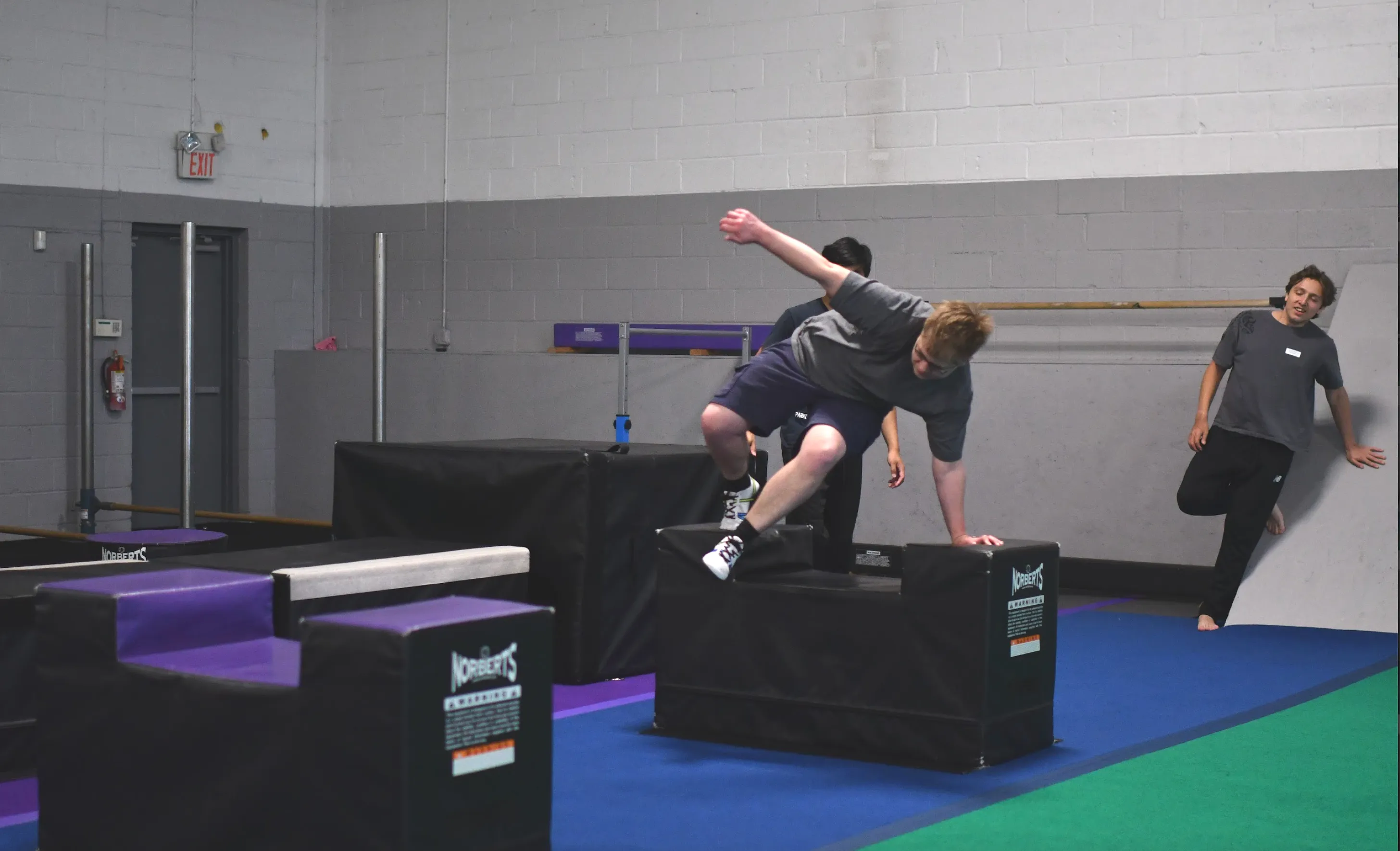 Athlete training on parkour obstacles at Bolt Parkour