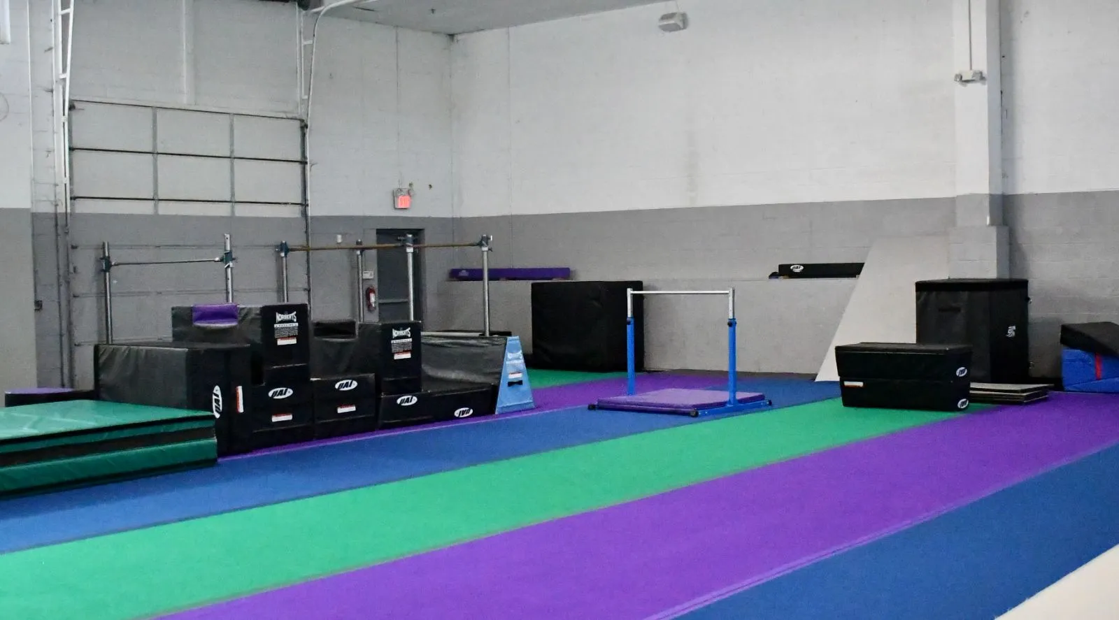 Bolt Parkour training floor with spring floor, bars and parkour boxes in North Bethesda, MD