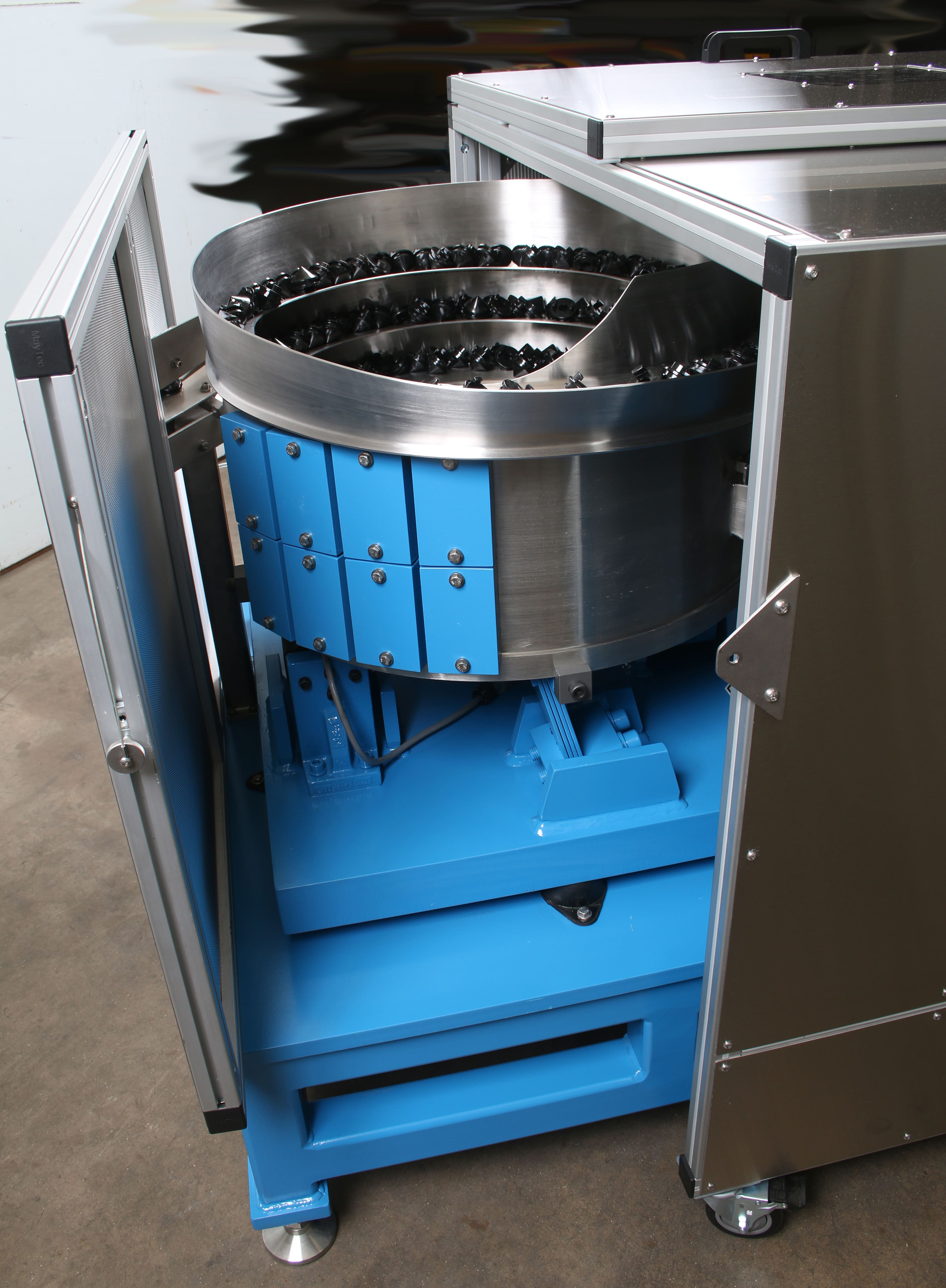 Sound enclosure for a feeder system