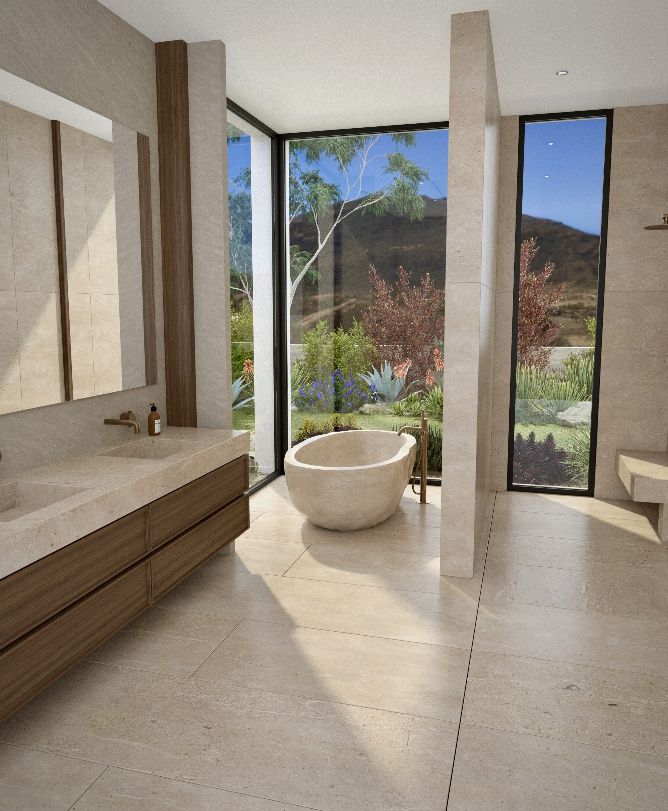 Primary bathroom at Santa Rosa Courtyard House by Mystic Sand in Palm Desert, California, with a sculptural stone bathtub and views of the garden.