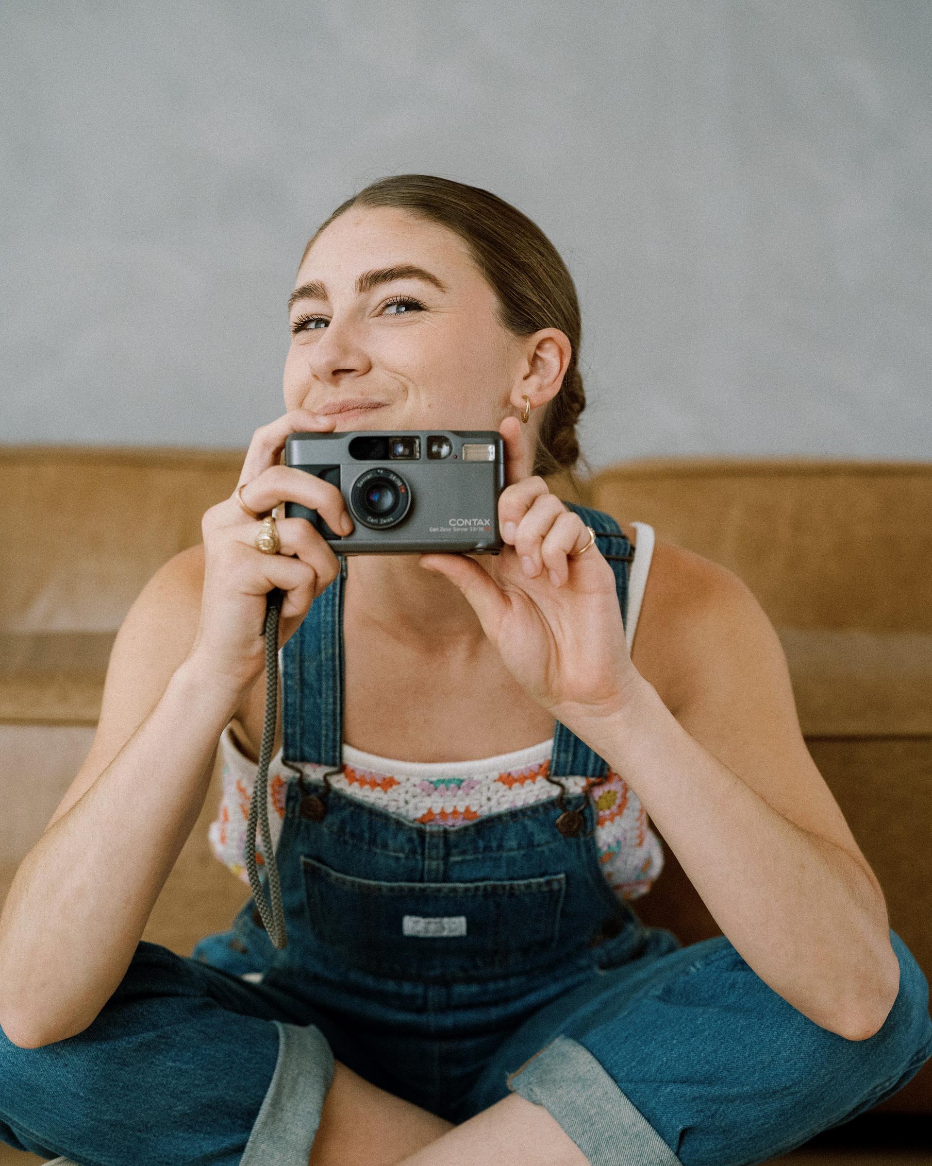 Audrey Lorfing with a film camera
