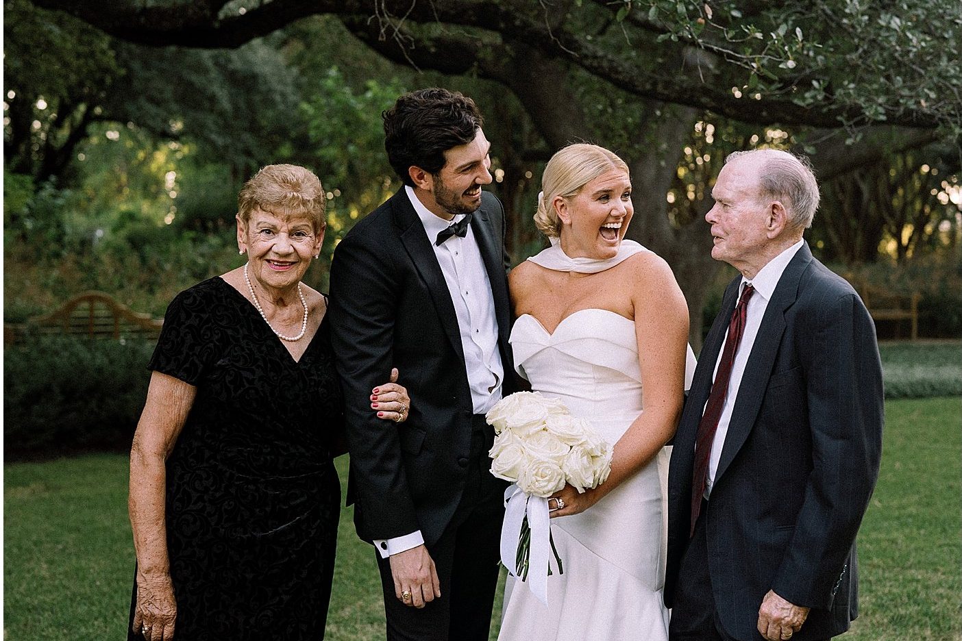 The couple with both sets of family members