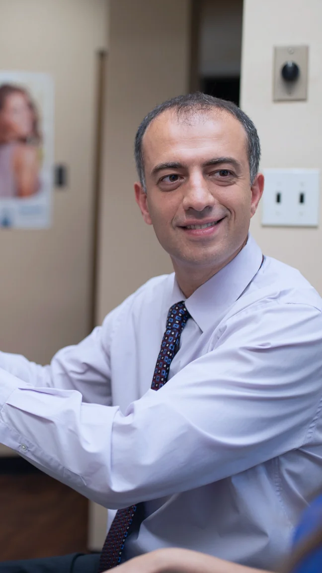 Dr. Ilya Ames explaining a patient’s options in plain terms