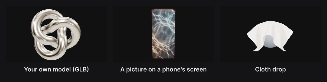 A chrome knot model, a phone model with a picture on its screen, and a cloth that has fallen over a ball