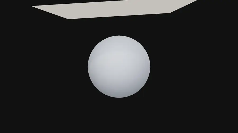 A square of cloth falling over a gray ball and settling into folds