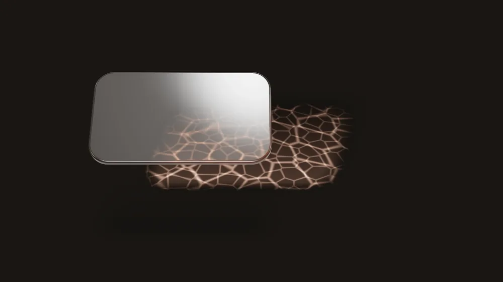 A glass card drifting over a dark floor, a web of warm light moving on the floor under it