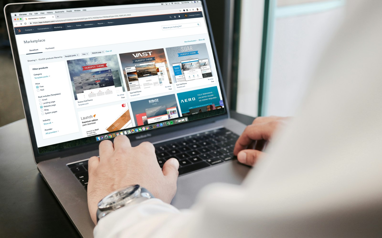 Laptop on a desk showing website analytics charts