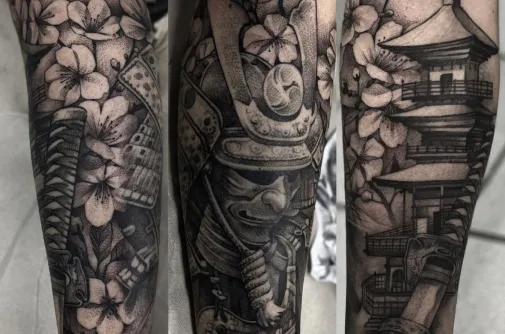 Japanese sleeve tattoo with a samurai, cherry blossoms and a pagoda