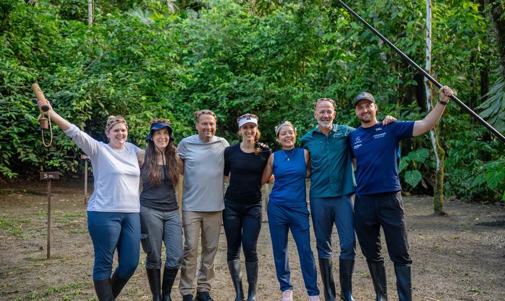 Retreat guests celebrating together in the Ecuadorian rainforest