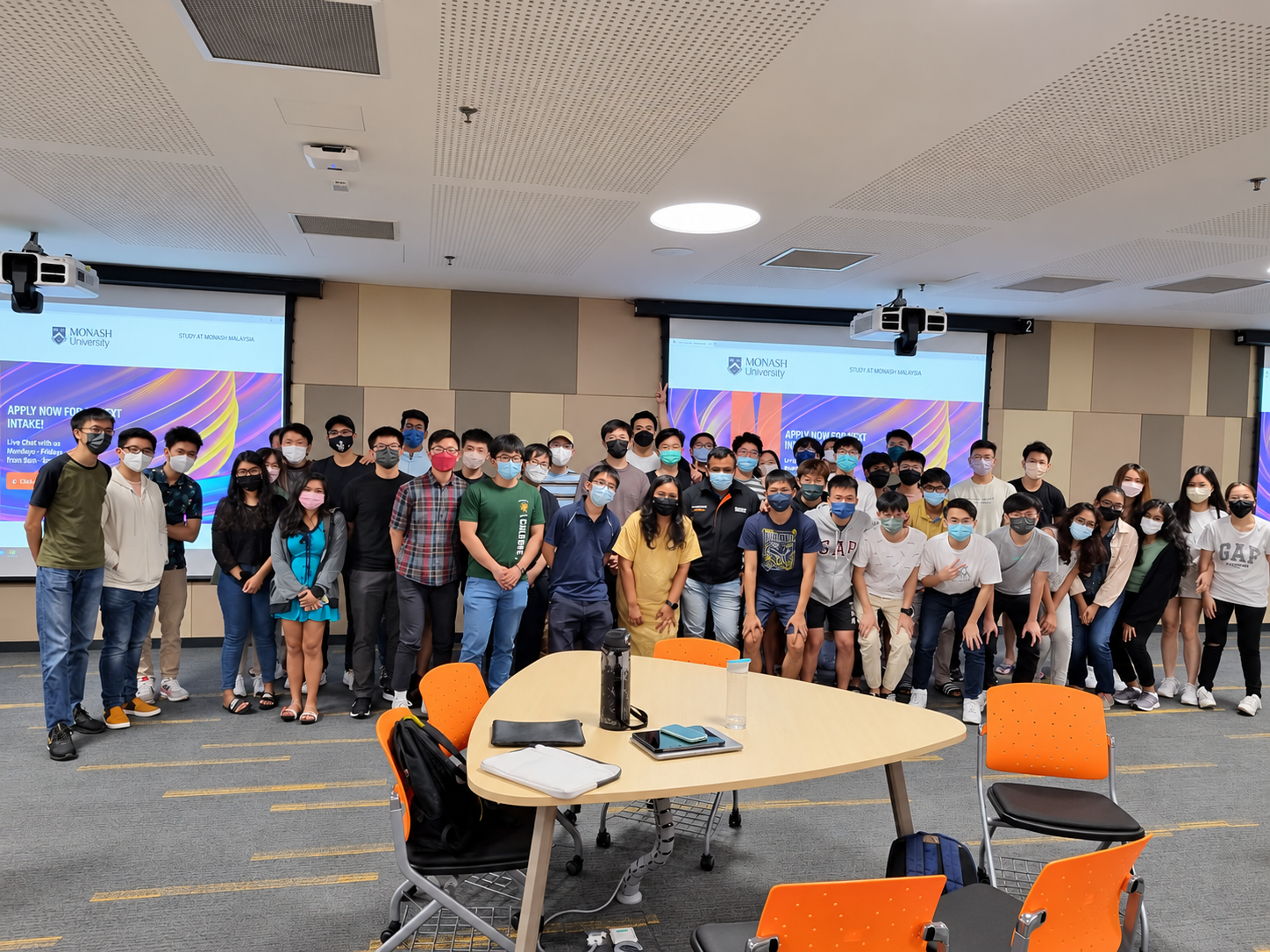 Group photograph of students and participants at Monash University