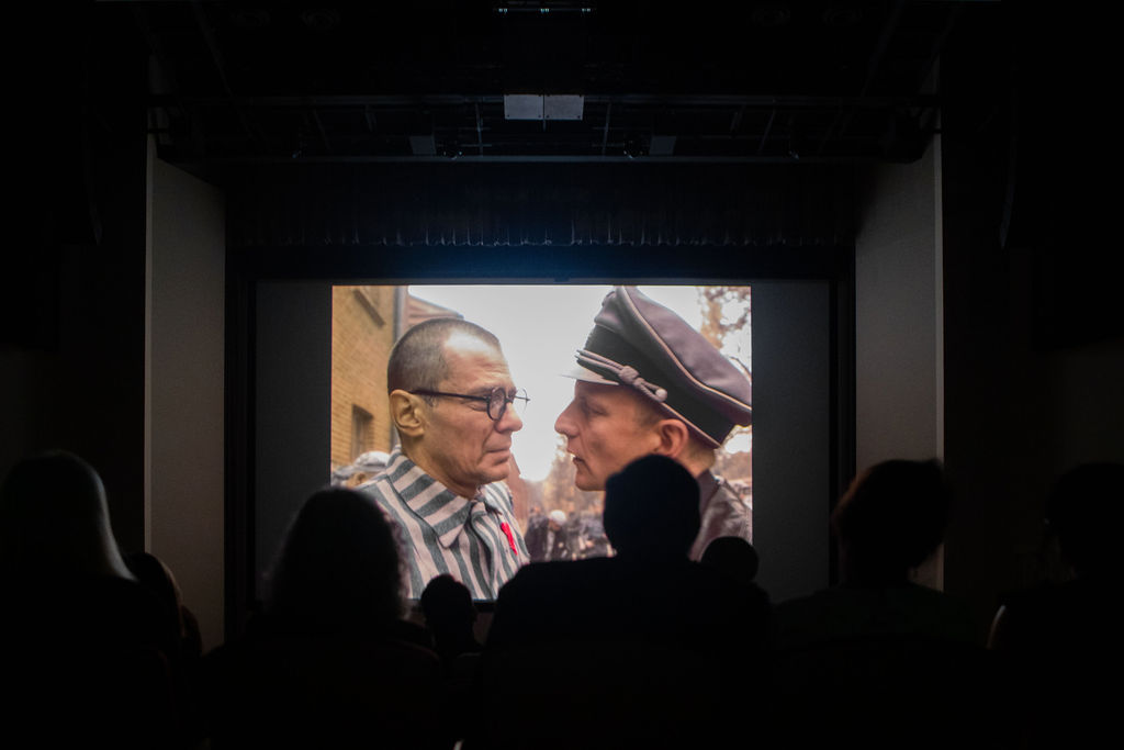 Audience watching Triumph of the Heart at the US premiere