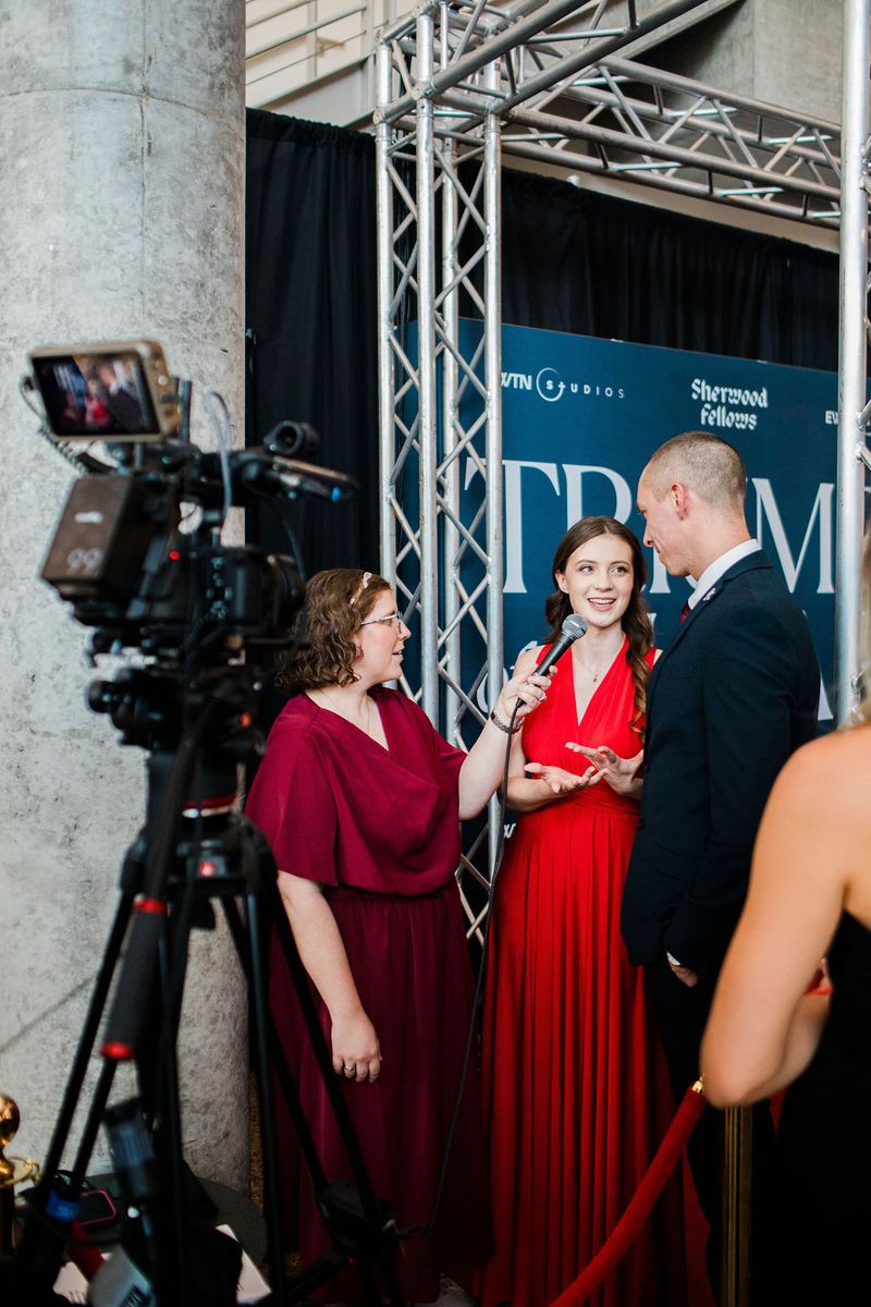 A guest interviewed on the red carpet