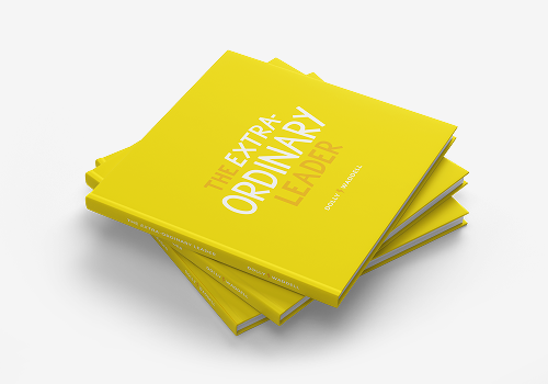 Stack of three bright yellow books titled 'The Extra-Ordinary Leader' by Daisy Vadoczki, arranged on a white surface.