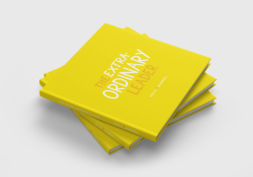 Stack of yellow hardcover books titled 'The Extra-Ordinary Leader' by Daisy Walker.
