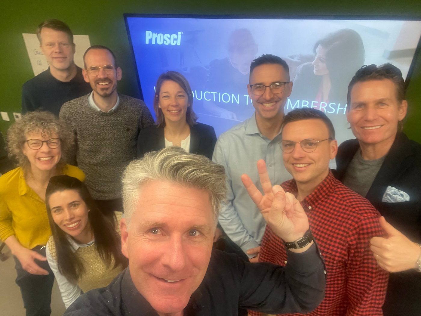 John with a commercial team at a team off-site
