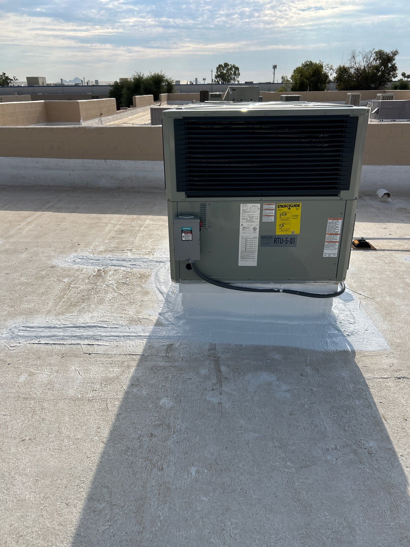 Flat Roof Restoration with HVAC Curb Sealing in Glendale, AZ