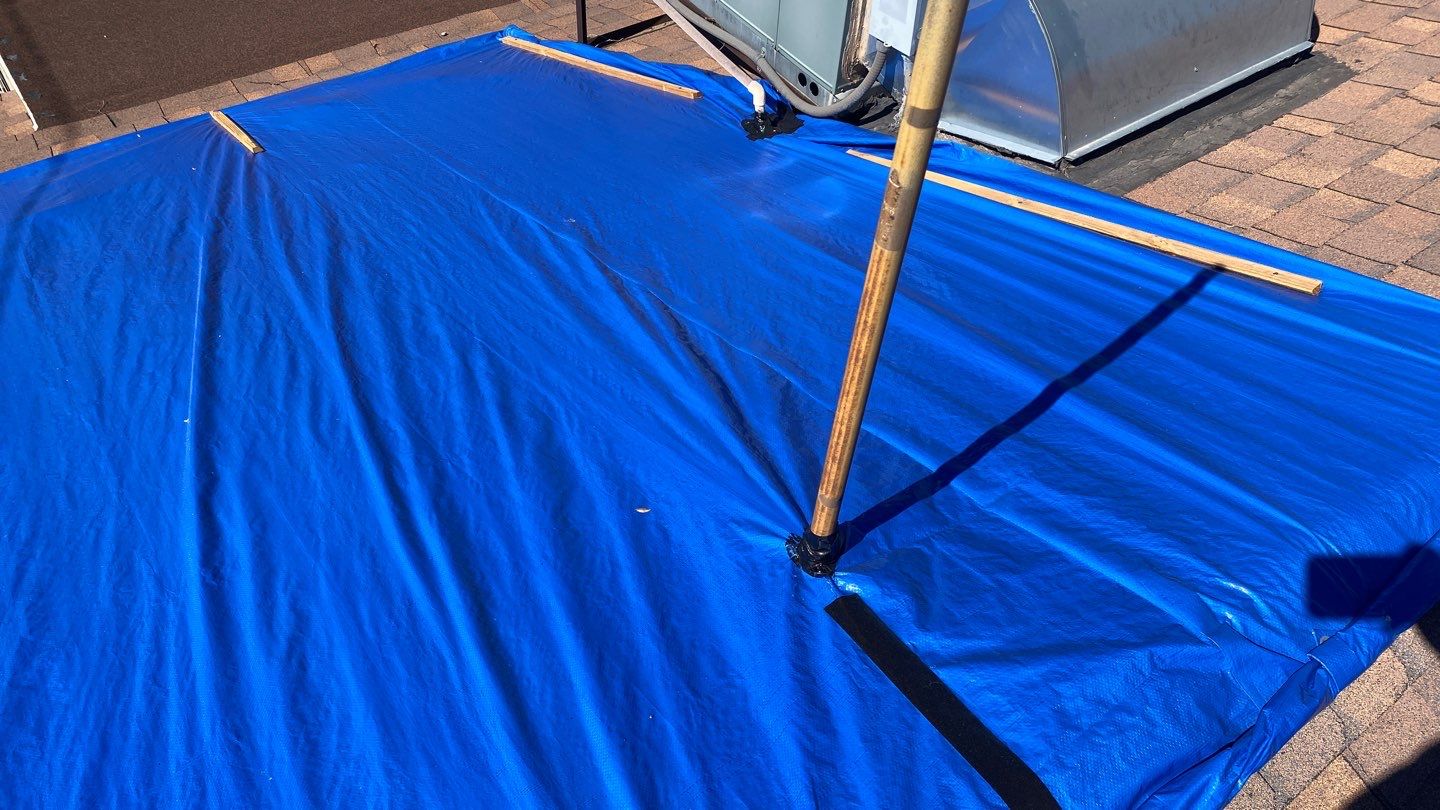 Emergency Shingle Roof Tarp With Wooden Supports In Phoenix, AZ