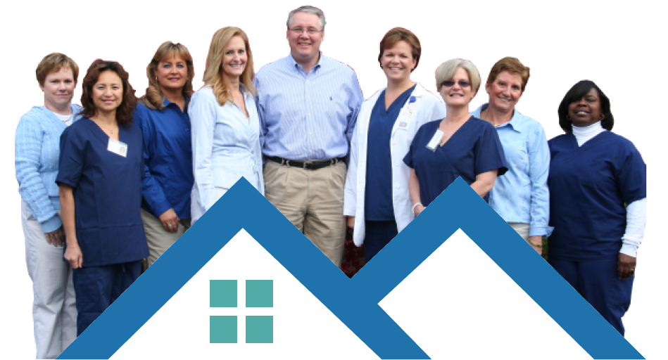 A diverse group of individuals gathered in front of a house, smiling and engaging with one another in a friendly atmosphere.