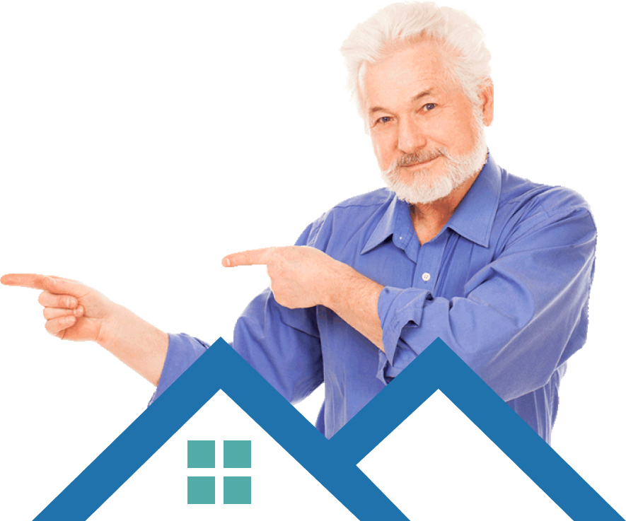 A man gestures towards a blue and white house, highlighting its features with an engaging expression.