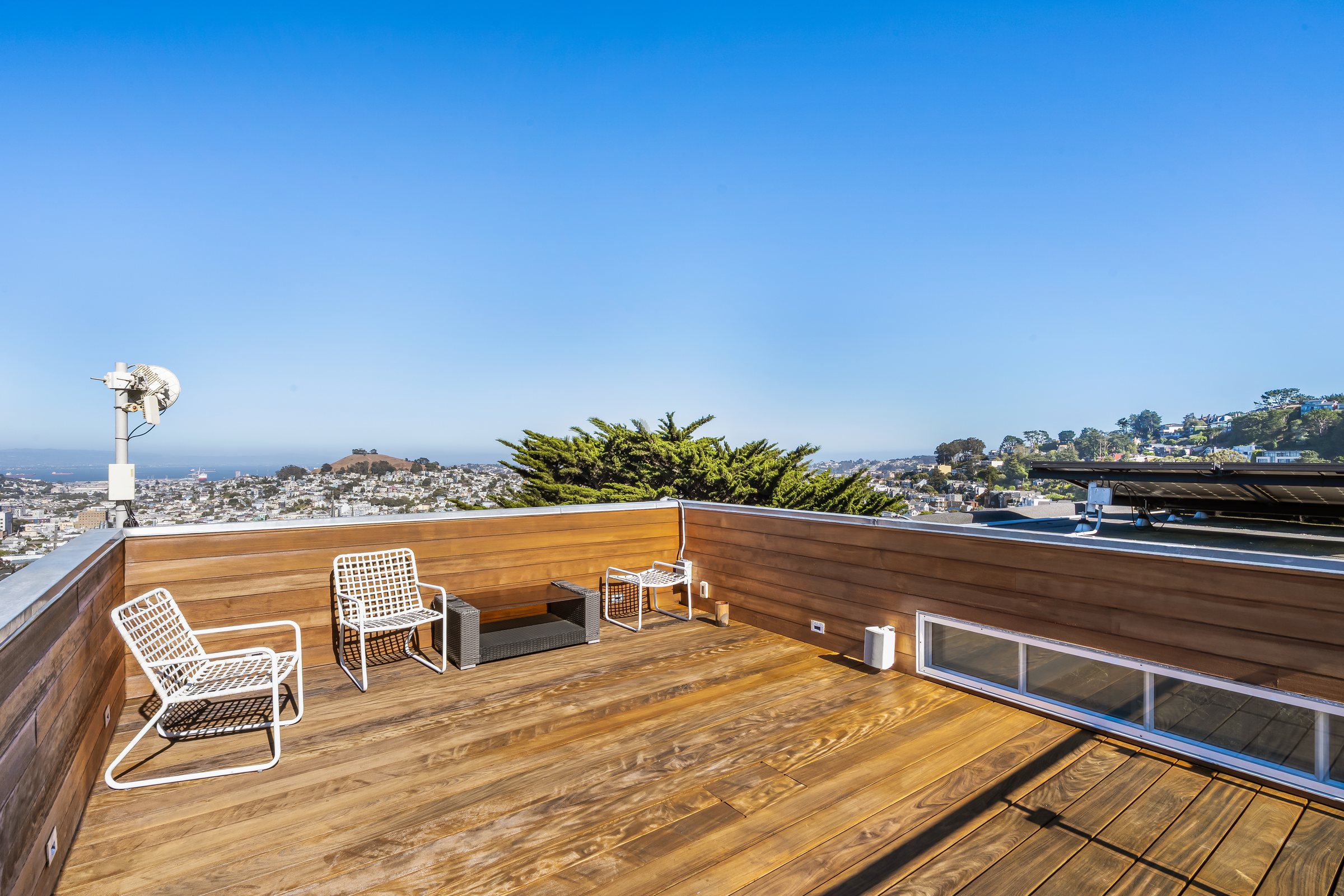 An empty roof deck before virtual staging, San Francisco. Virtual staging by Lumiful Media