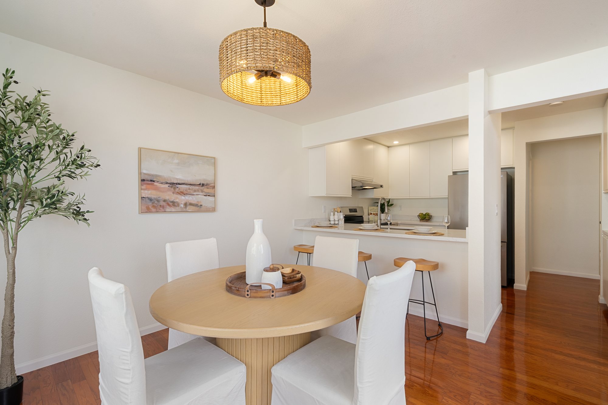 The kitchen and dining room of a home in San Jose. Real estate photography by Lumiful Media