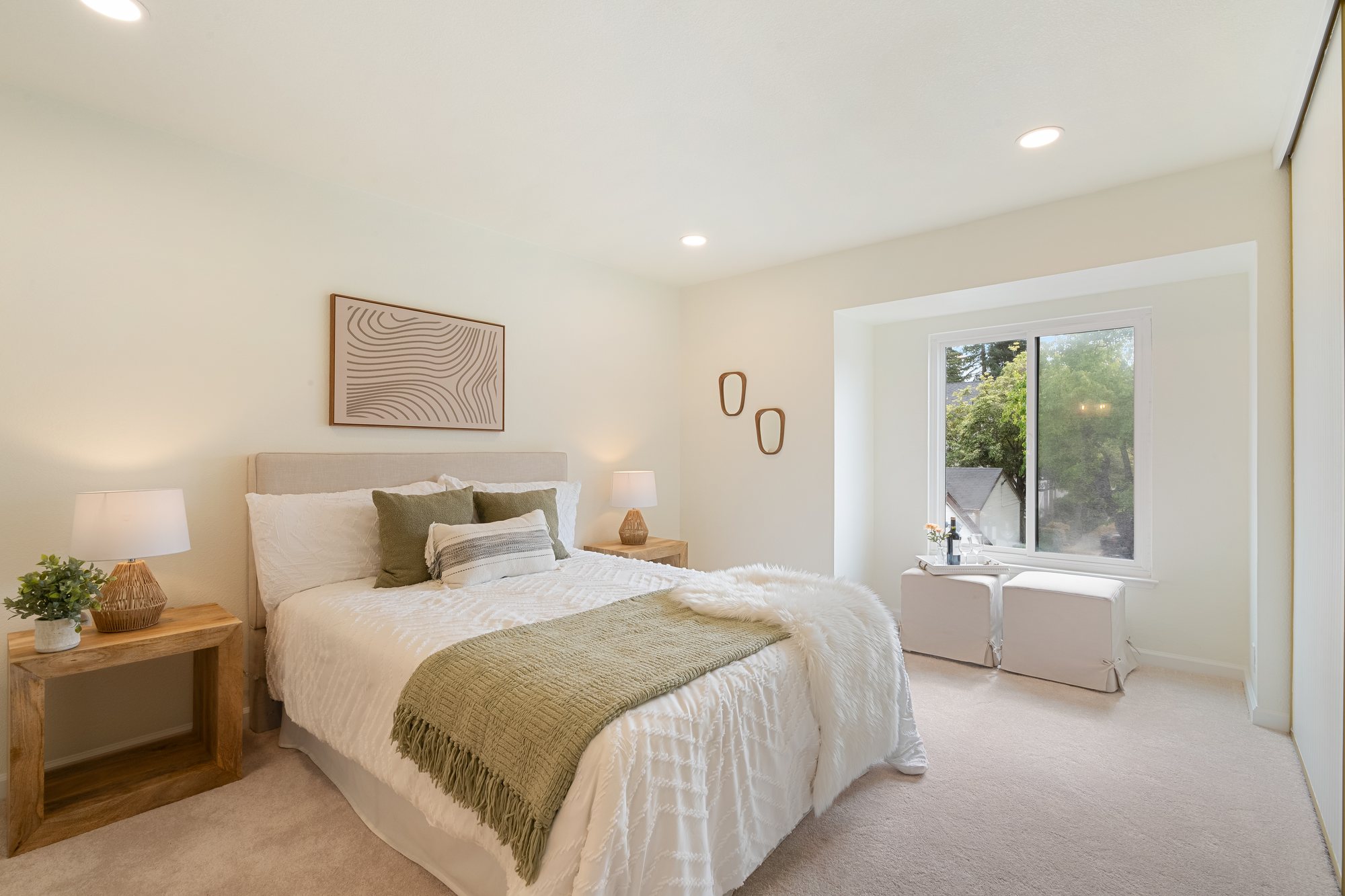 The primary bedroom of a home in San Jose. Real estate photography by Lumiful Media
