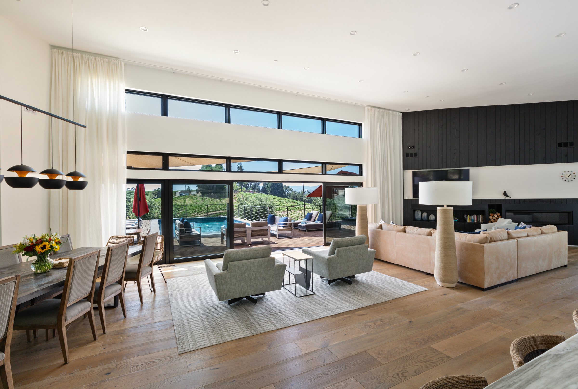A great room that opens to the pool, San Francisco Bay Area. Real estate photography by Lumiful Media