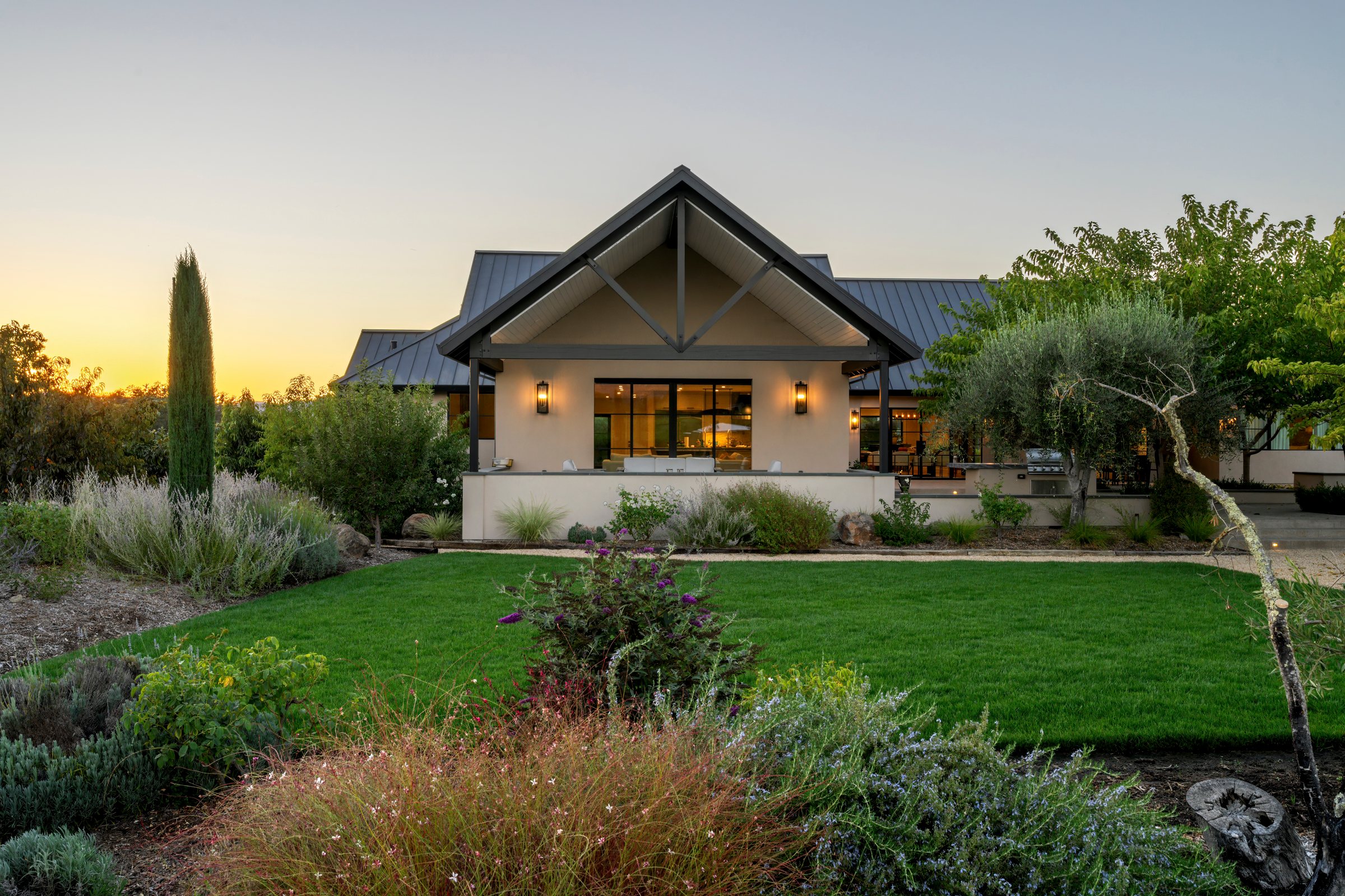 A ranch home and garden at dusk, San Francisco Bay Area. Twilight real estate photography by Lumiful Media