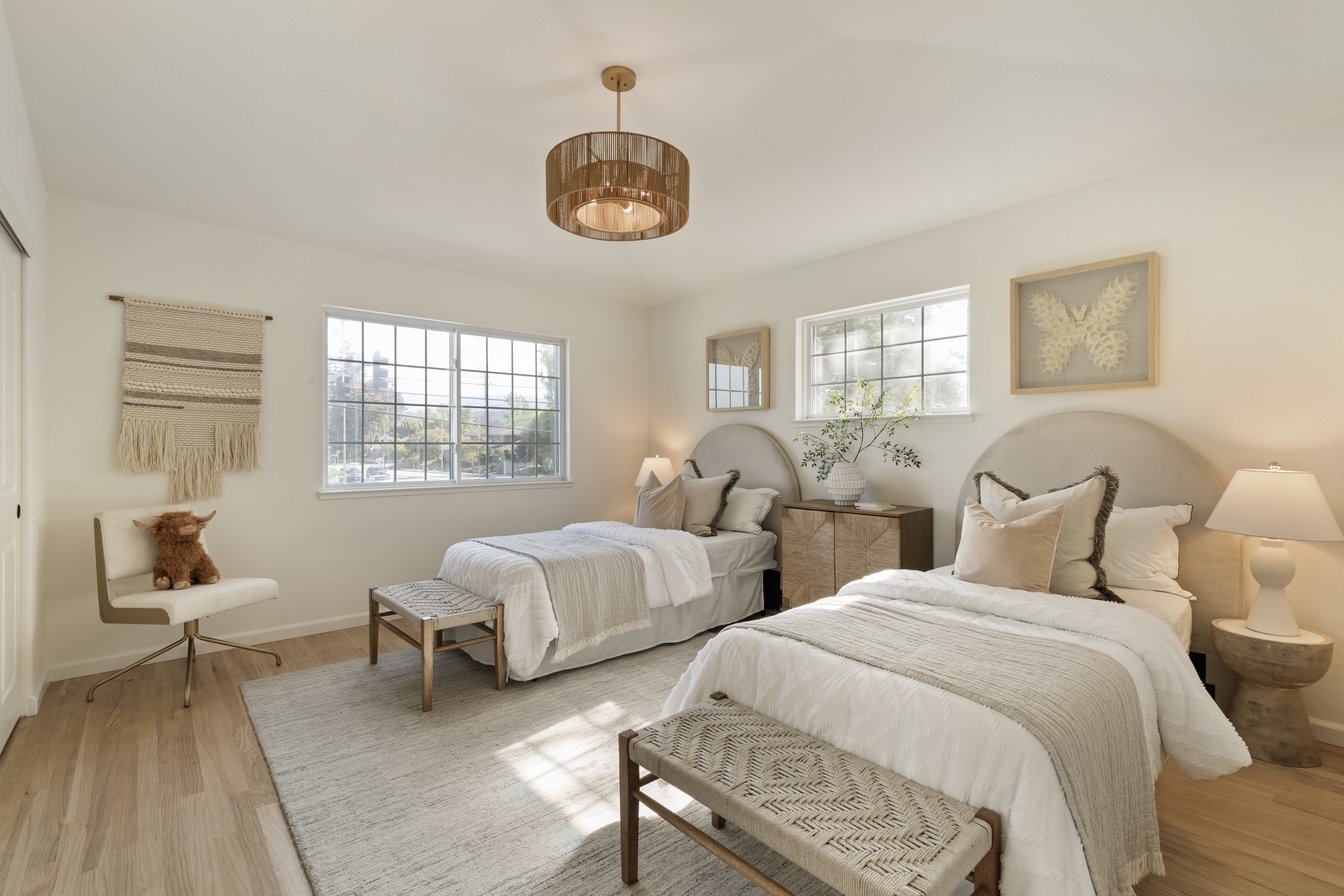 A bedroom with two beds, Cupertino. Real estate photography by Lumiful Media