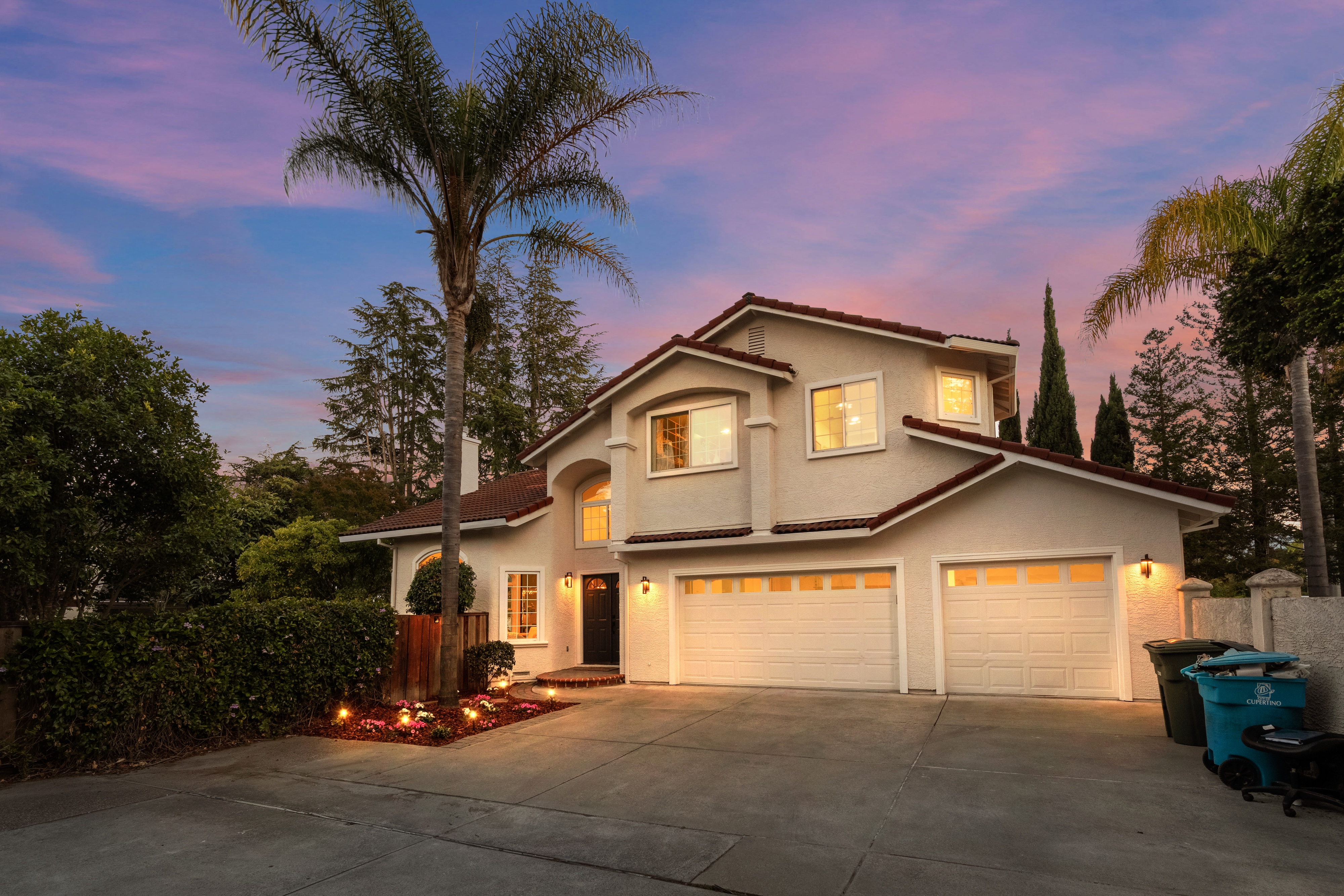 A Mediterranean style home at dusk, Cupertino. Twilight real estate photography by Lumiful Media